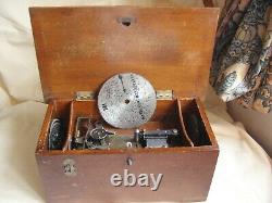 A nice old antique polyphon music / musical box including nine 4 1/2 discs