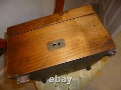 Antique Polyphon music box with 18 discs in working order case needs attention