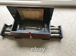 Antique Swiss Music Box by P. V. F has 6 INTERCHANGEABLE Cylinders playing 36 Airs