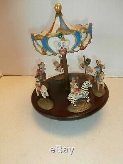 Antique/vintage Carouselwithclown Rider Music Box Wood And Ceramictop Decor