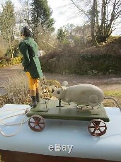 Automaton pull along figure. Robert Burns pursued by a giant mouse. One off