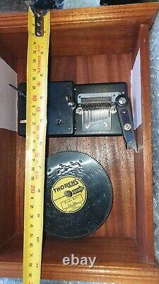 Miniature polyphon company music box and 12 (4 1/2) discs. VERY RARE