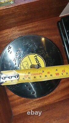 Miniature polyphon company music box and 12 (4 1/2) discs. VERY RARE