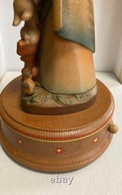 Swiss luge music box Henri wood carving doll