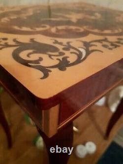 Vintage Italian Marquetry musical box on legs. Full working condition