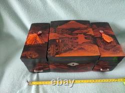 Vintage Japanese black lacquer music boxjewelry box, likely from the20th century