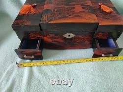 Vintage Japanese black lacquer music boxjewelry box, likely from the20th century