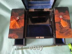 Vintage Japanese black lacquer music boxjewelry box, likely from the20th century