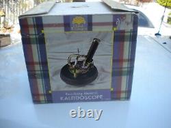 Vintage Kaleidoscope Wind Up Music Box Rotating Wood Brass in the box