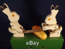 Vintage wood toy music box rabbits sawing a carrot 60's 70's Very good cond